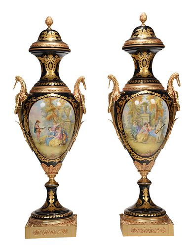 A Monumental Pair Sevres Style Gilt Bronze Mounted Urns