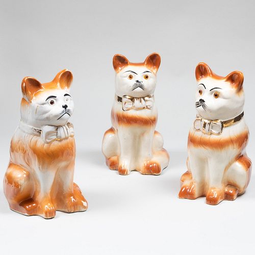 Two Pairs of Staffordshire Cats and another Cat