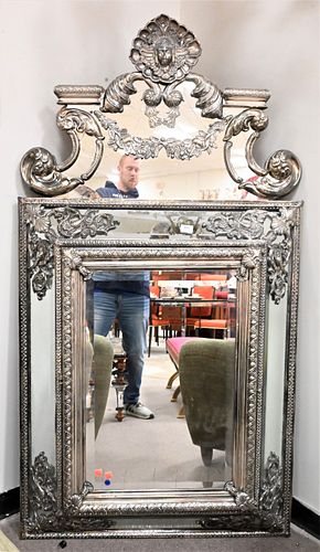 A Baroque Style Silvered Cast-Metal Mirror