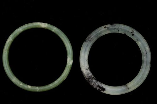 Two Chinese Carved Green Hardstone Bangles