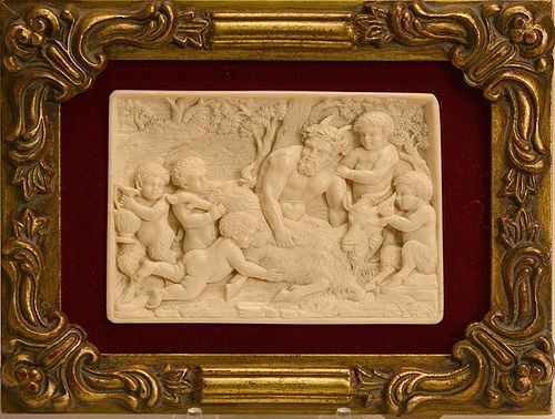 Well carved 19th C. ivory plaque of satyr figures with goat suckling a young child