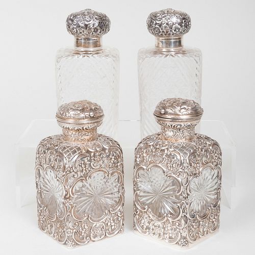 Two Pairs of Silver Mounted Cut Glass Scent Bottles