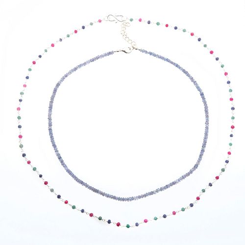 Dos collares con  tanzanitas, rubíes, zafiros y esmeraldas en plata .925. Peso: 5.6 g.