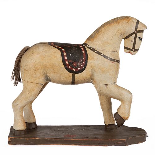 FOLK ART CARVED AND PAINTED WOODEN FIGURE OF A HORSE