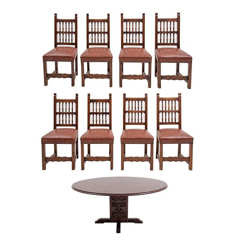 COMEDOR. SXX. Elaborado en madera. Decorado con molduras, elementos arquitectónicos y orgánicos. Consta de: Mesa y 8 sillas.