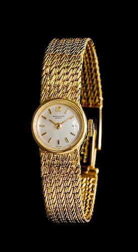 An 18 Karat Yellow Gold Ref. 3215/29 Wristwatch, Patek Philippe,