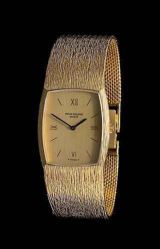 An 18 Karat Yellow Gold Ref. 125357 Wristwatch, Patek Philippe,