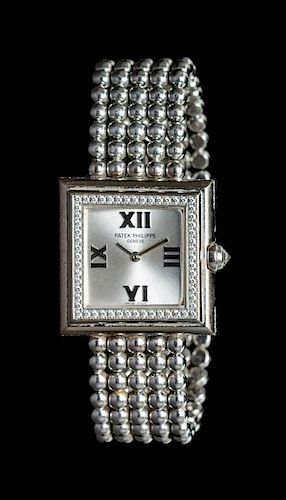 An 18 Karat White Gold and Diamond Ref. 4868-001 Wristwatch, Patek Philippe,