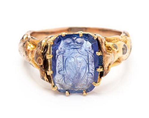 * A Victorian Yellow Gold and Sapphire Intaglio Ring, 3.40 dwts.
