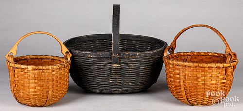 Painted basket and two swing handled baskets