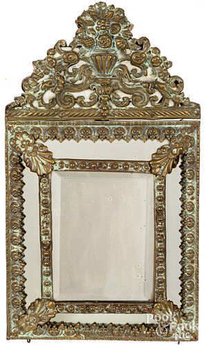 Mirror with embossed brass frame, 19th c.