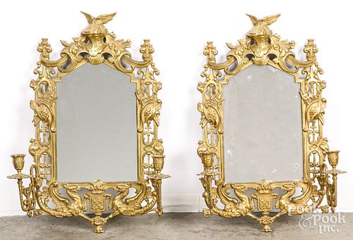 Pair of mirrored brass sconces