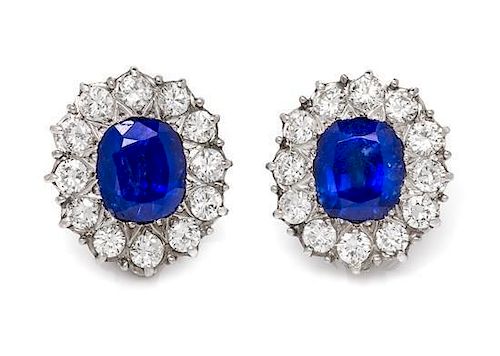 A Pair of Platinum, Burmese Sapphire and Diamond Earclips, 4.20 dwts.