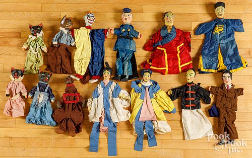 Thirteen WPA project papier-mâché puppets