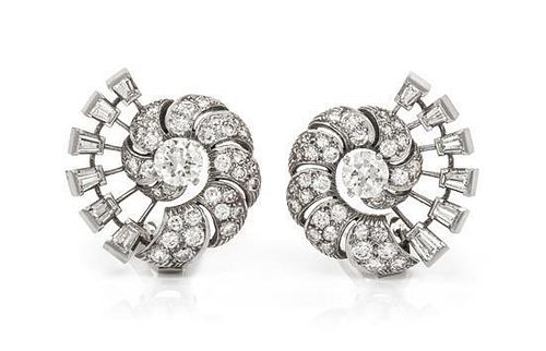 A Pair of Platinum and Diamond Earclips, 9.90 dwts.