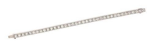 An Art Deco Platinum and Diamond Line Bracelet, 13.60 dwts.