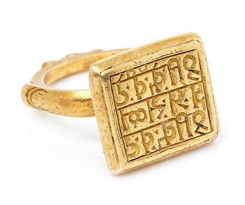 * A Possibly Ancient Yellow Gold Southeast Asian Signet Ring, 11.00 dwts.