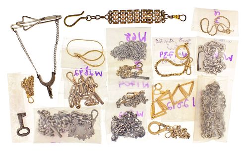 A lot of pocket watch chains and miscellanea