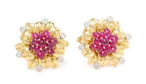 A Pair of 18 Karat Bicolor Gold, Ruby and Diamond Earclips, Aletto Brothers, 17.80 dwts.