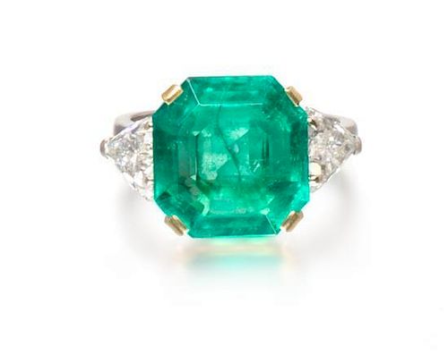 An 18 Karat Yellow Gold, Emerald and Diamond Ring, 4.70 dwts.