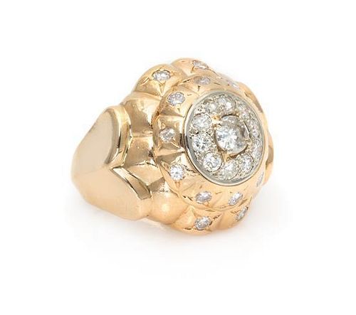 A 14 Karat Yellow Gold and Diamond Ring, 12.50 dwts.