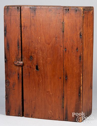 Small primitive pine hanging cupboard, 19th c.