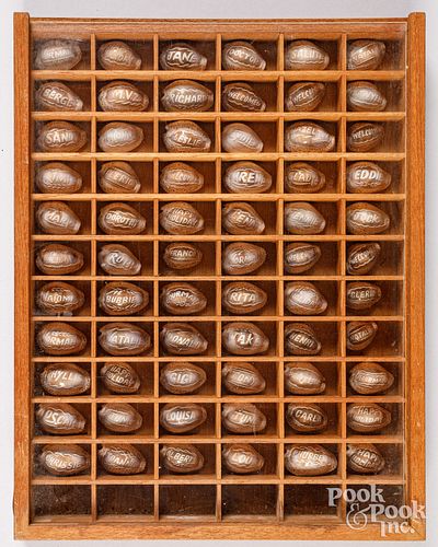 Collection of carved souvenir Cowrie shells