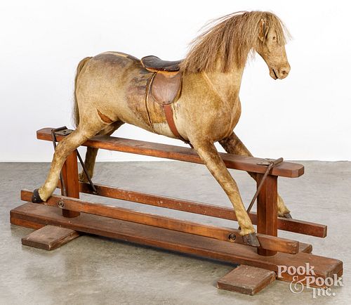 Horse hide covered rocking horse, 19th c.