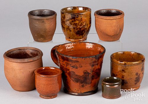 Eight pieces of redware, 19th c.