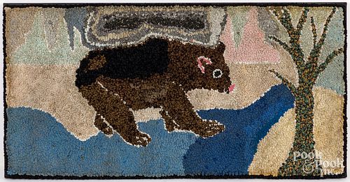 Hooked rug of a bear