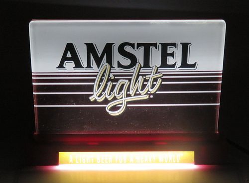 1982 Amstel "Light Beer for a Heavy World" Edge-lit plastic Light Backbar Sign 