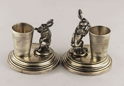 Pair of bronze toothpick holder rabbits on an oval base