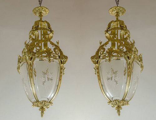 Pair of lanterns in bronze and glass
