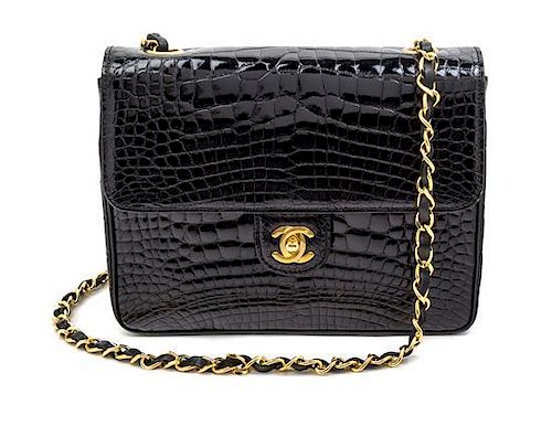 * A Chanel Black Alligator Flap Handbag, 8" x 6" x 2.5".