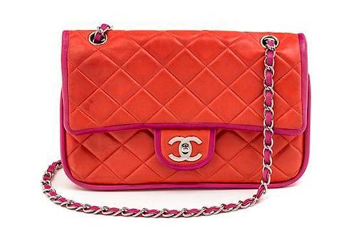 * A Chanel Coral and Magenta Quilted Double Flap Handbag, 10" x 6.5" x 2".