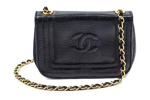 * A Chanel Navy Lizard Flap Handbag, 6.5" x 4.5" x 1.5".
