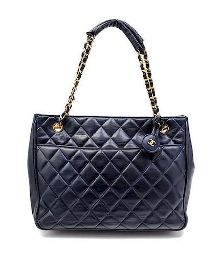 * A Chanel Navy Quilted Leather Tote Handbag, 12" x 8" x 2".