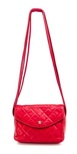 * A Chanel Red Quilted Handbag, 8" x 6" x 2"