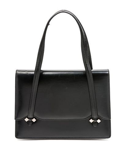* A Gucci Black Leather Handbag, 8.5" x 6" x 1"