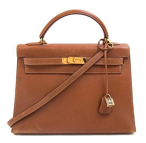 An Hermes Brown Leather Kelly Handbag, 13" x 8 1/2" x 4 3/4".