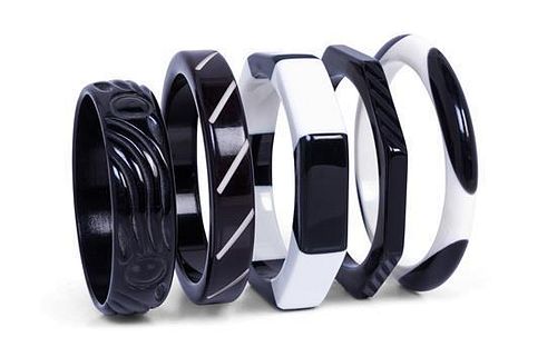 A Group of Five Black and White Bakelite Bangles,