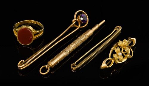 Group of gold  jewellery, an Edwardian floral brooch, amethyst set brooch, carnelian set ring, tie pin and a gold pencil, all