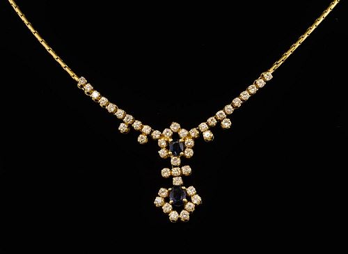 Sapphire and diamond necklace, comprising a sapphire and diamond drop to the centre with further diamonds to each side. Mount