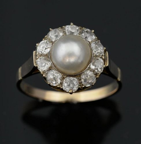 Diamond and pearl ring,  the central pearl within a border of  ten old cut diamonds, total diamond weight estimated at 1.00 c