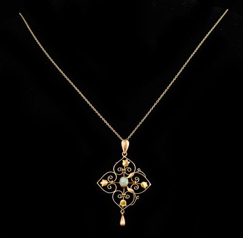Edwardian gold and opal open work pendant, 15 ct, on gold chain 9 ct .