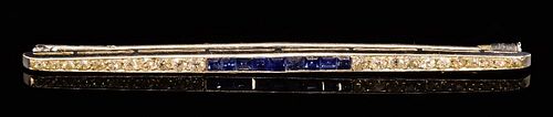 Edwardian diamond and  sapphire bar brooch, set with old cut diamonds and square step cut sapphires, French mark