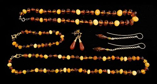 Amber bead necklaces and earrings and a pair of carnelian drop earrings