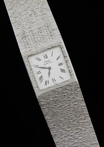Piaget 18ct white gold bracelet watch, on a textured integral bracelet, quartz movement,