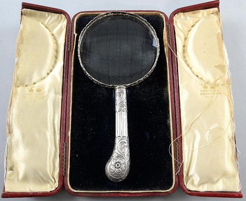 Victorian silver mounted hand-held magnifying glass with pierced scrolling foliate decoration, by Rosenthal, Jacob & Co., Lon