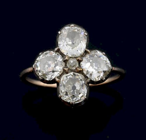 Queen Caroline's ring.An early 19th Century diamond quatrefoil ring, designed with four old-cut diamonds and a smaller diamon